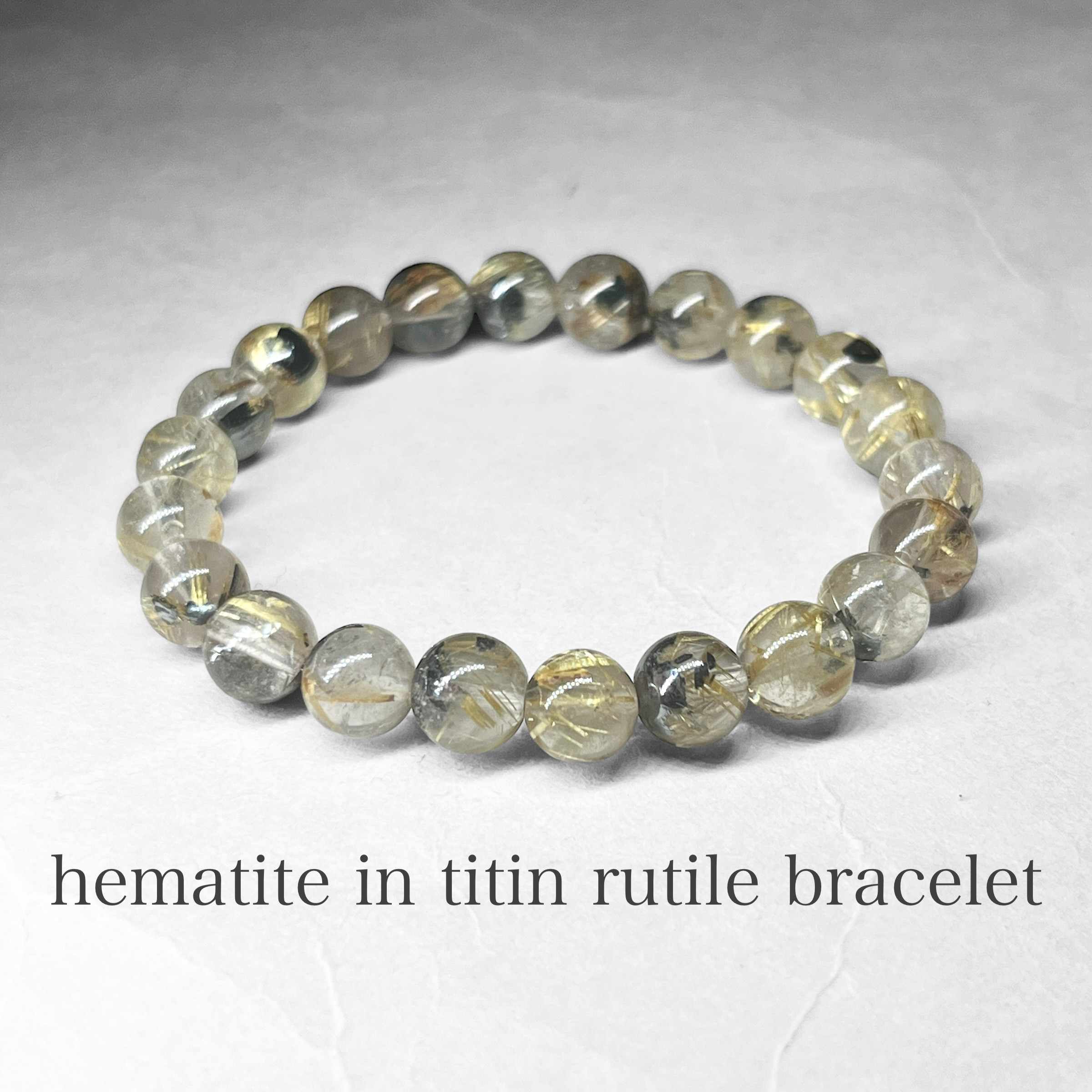 hematite in titin rutile bracelet / ヘマタイトインタイチンルチルブレスレット 7mm