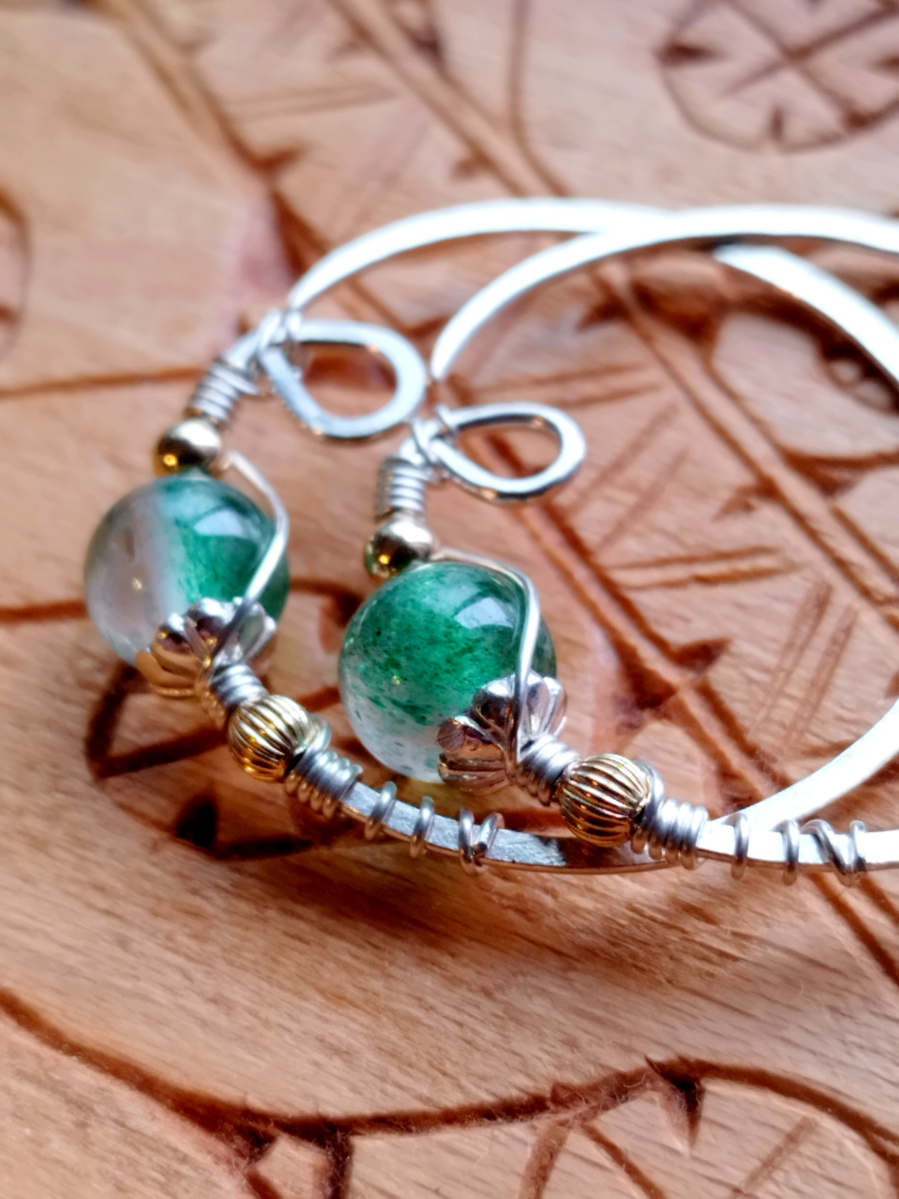 [受注製作]sak nitay（サㇰ ニタイ・夏の森）のニンカリ【アイヌの耳飾り・ピアス】エピドートインクォーツ