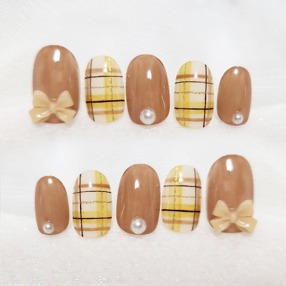 チェックとリボンのガーリーネイル/イエローベース/リボン/チェック/ネイルチップ 1枚目の画像