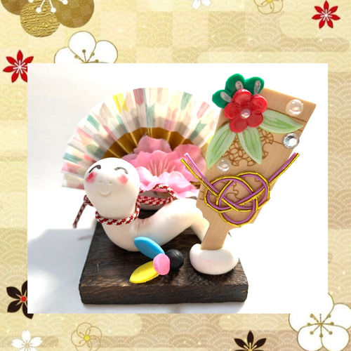 お正月羽子板と蛇飾り お正月羽子板と蛇飾り お正月羽子板と蛇飾り