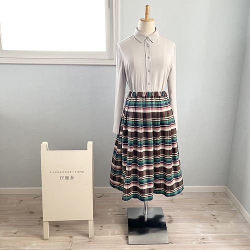 THREE FIFTY STANDARD チェックのプリーツスカート〈グリーン