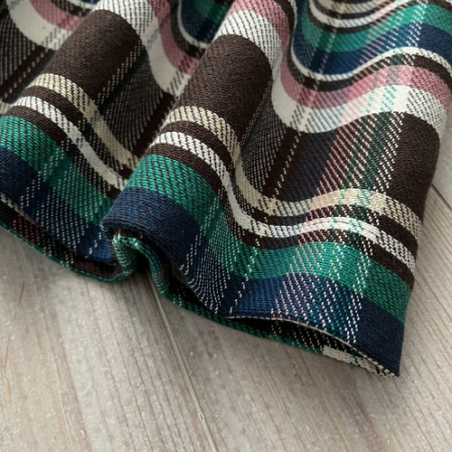 THREE FIFTY STANDARD チェックのプリーツスカート〈グリーン