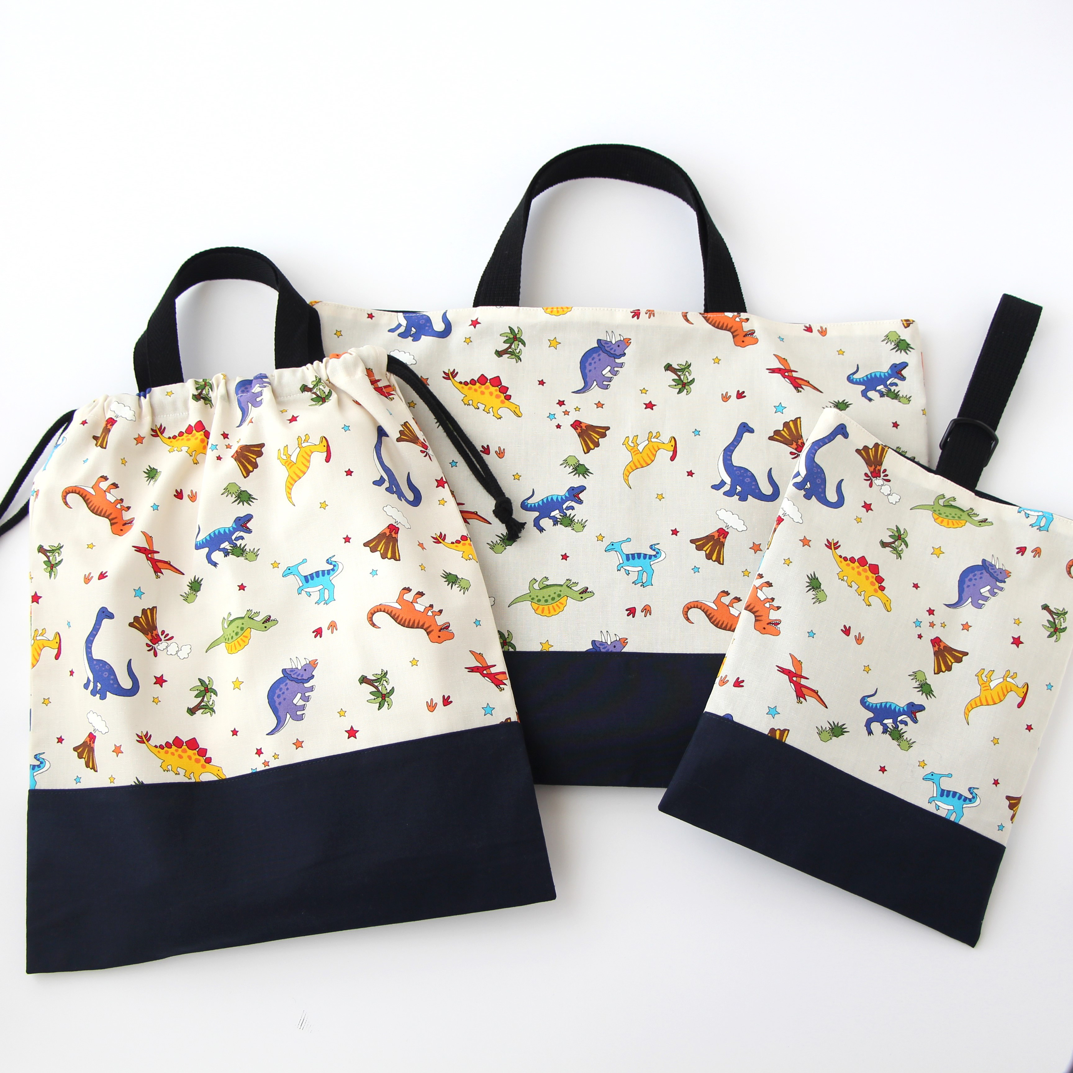 入園入学3点セット（恐竜　ホワイト）レッスンバック＆上履き入れ＆持ち手付きお着換え袋