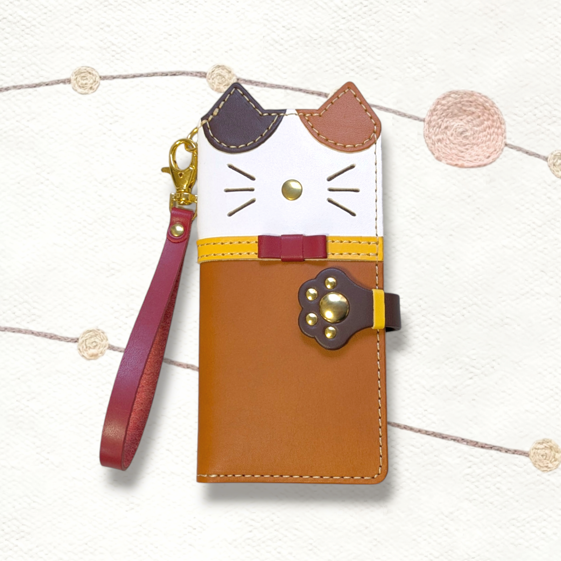 ＊leather sumyaho case＊手帳型 三毛猫のレザースマホケース＊リボン付き／全機種