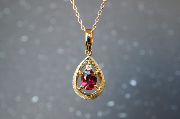 レッドスピネル　シンプルスターダスト梨地　ペンダントトップ１８金イエローゴールド　ダイヤモンド入り 1枚目の画像