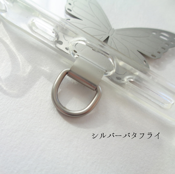 ステンレス ストラップホルダー バタフライ＆クローバー 背面に挟む ストラップが取付けできる スマホホルダー 6枚目の画像