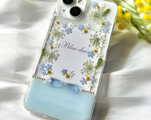 きらめくリボンと忘れな草 ミモザ｜iPhone17 / Android対応