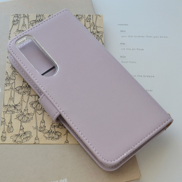 手帳型スマホケース『猫と月の宇宙旅行』上品パステルカラー 薄紫 ほぼ全機種対応◎ 7枚目の画像