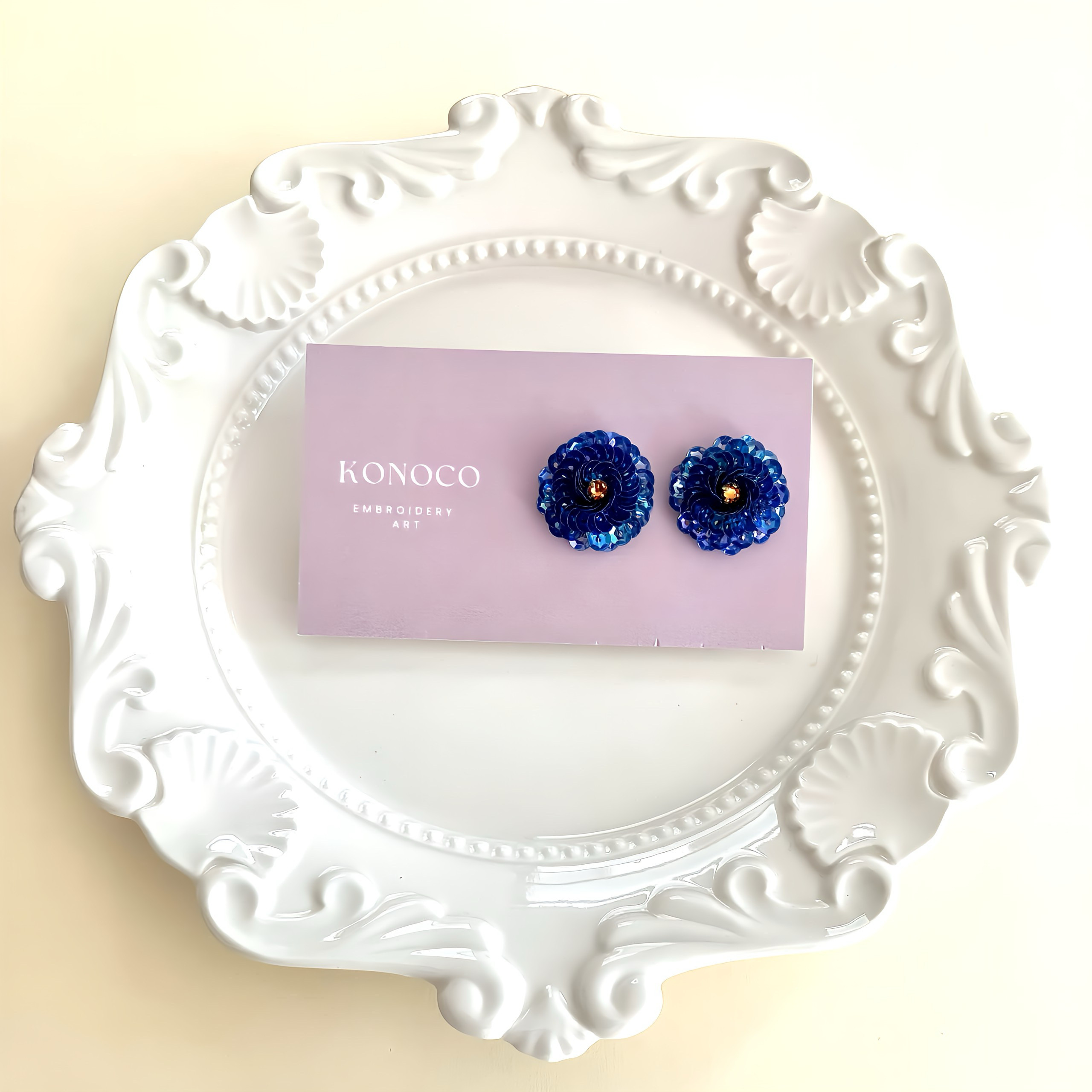 ラナンキュラスの耳飾り(オーロラディープブルー×トパーズ)