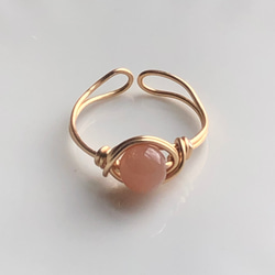 オレンジムーンストーン◇ぐるぐる◇天然石◇フリーサイズリング