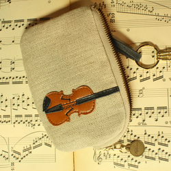 也可作小提琴包、卡包或鑰匙包使用。 第3張的照片