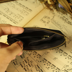 也可作小提琴包、卡包或鑰匙包使用。 第5張的照片