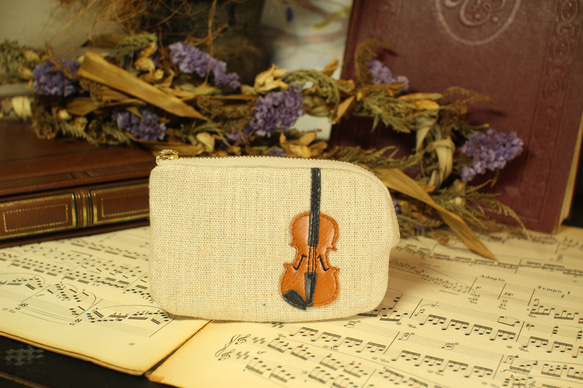 也可作小提琴包、卡包或鑰匙包使用。 第1張的照片