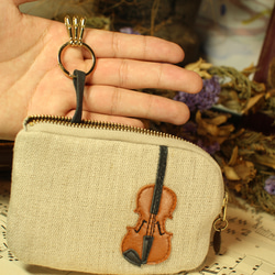 也可作小提琴包、卡包或鑰匙包使用。 第6張的照片