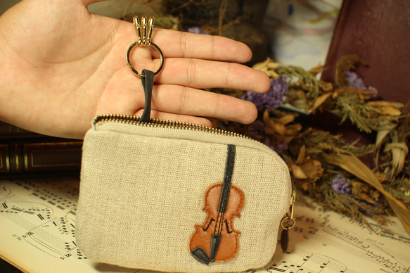 也可作小提琴包、卡包或鑰匙包使用。 第6張的照片