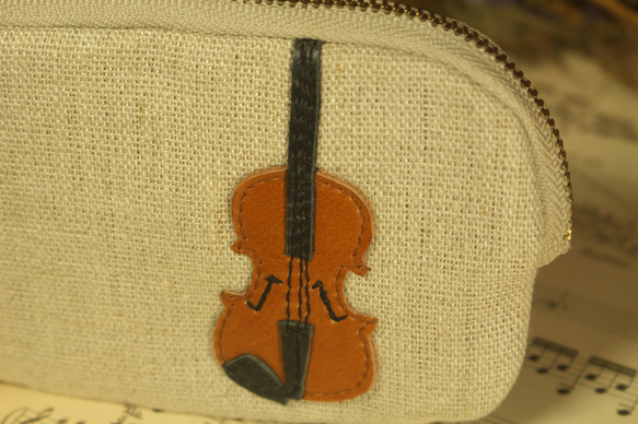 也可作小提琴包、卡包或鑰匙包使用。 第2張的照片
