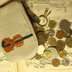 也可作小提琴包、卡包或鑰匙包使用。 第7張的照片