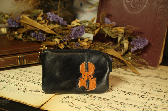 也可作小提琴包、卡包或鑰匙包使用。 第12張的照片