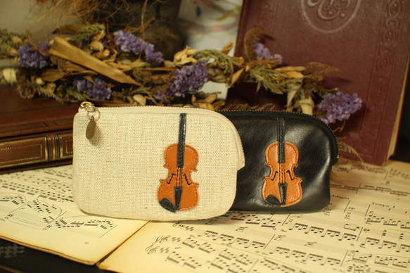 也可作小提琴包、卡包或鑰匙包使用。 第11張的照片