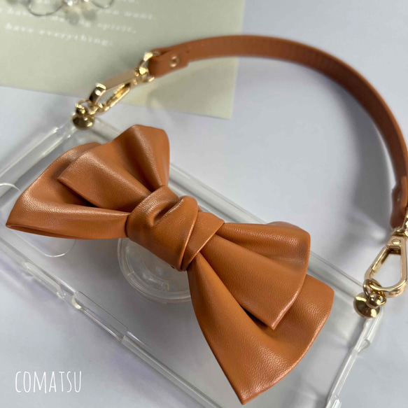 【全機種対応】大ぶりPUレザーりぼん スマホケース グリップソケット+ハンドストラップ付き スマホカバー 2枚目の画像