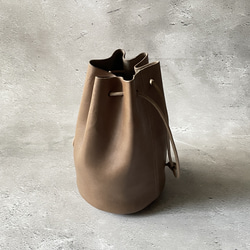 本革 韓国デザイン レザーステッチ巾着バッグ トートバッグ BAG テュケー トートバッグ 巾着バッグ 本革 メンズ レディース