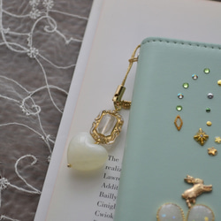 レア機種にも対応！手帳型スマホケース『うさぎとミントグリーンの庭 』milky white flowers全機種注文可◎ 5枚目の画像