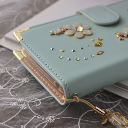 レア機種にも対応！手帳型スマホケース『うさぎとミントグリーンの庭 』milky white flowers全機種注文可◎ 4枚目の画像