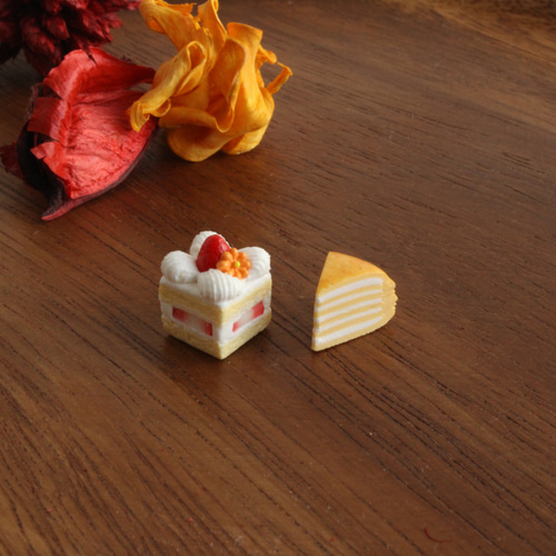 e.m. シルバーショートケーキチャーム エラベルクリーミーマカロン クリームチャーム(シルバー) | Q