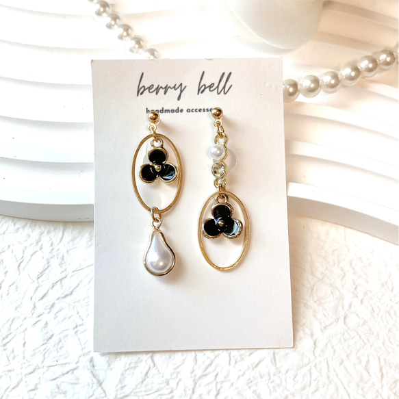 再販52 夏 オルテガ タッセル リボン ネイティブ 白 黒 ピアス