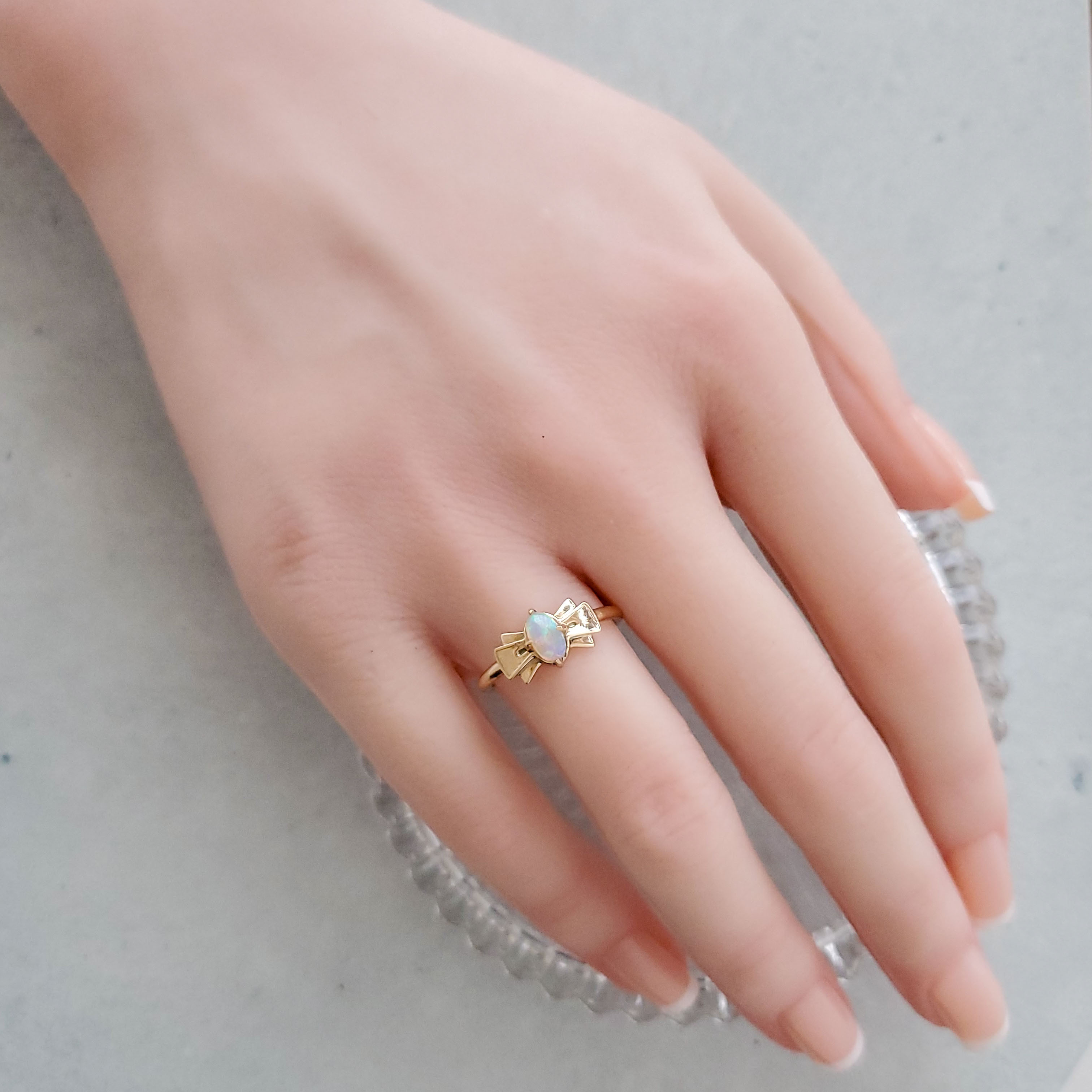 【受注制作】オパール リボン リング 指輪 ホワイトオパール オーバル 楕円 10金 10K レディース かわいい ハン