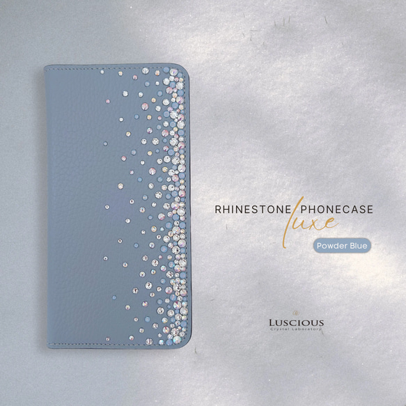 スワロフスキーラインストーンデコレーション本革手帳型スマホケース【パウダーブルー】 1枚目の画像