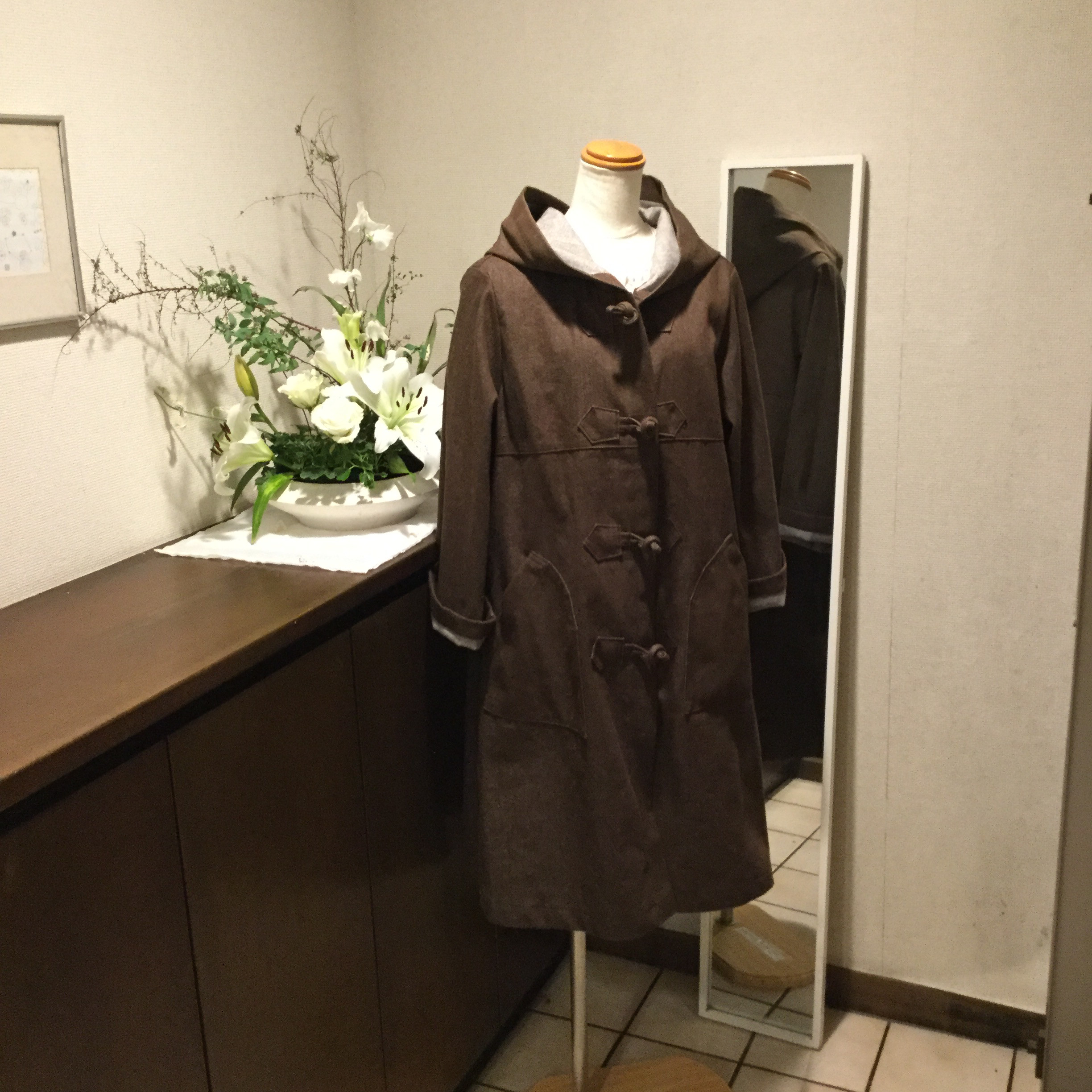 ココアブラウンのデニムのダッフルコート