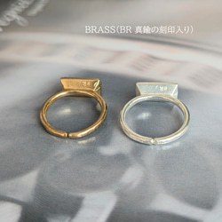 銀色款。 ◆ 這款引人注目的獨特立方氧化鋯鑽石戒指，採用罕見的精美矩形錘紋工藝。聖誕情侶款。 第13張的照片