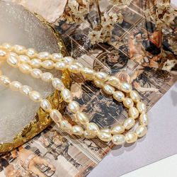 【再販】淡水パール ライス クリーム 4㍉ 40cm 貫通穴 パール ビーズ チャーム 1枚目の画像