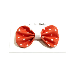 millet field 大きめまぁるいリボンのヘアクリップ(コーラルオレンジにドット柄)ベビー&キッズ　春色 2枚目の画像