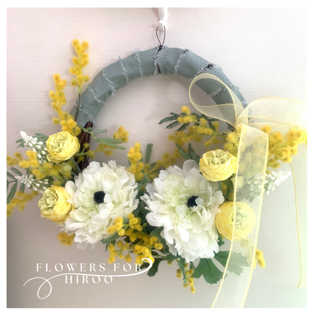 春のミモザとラナンキュラスがかわいいイエローリース