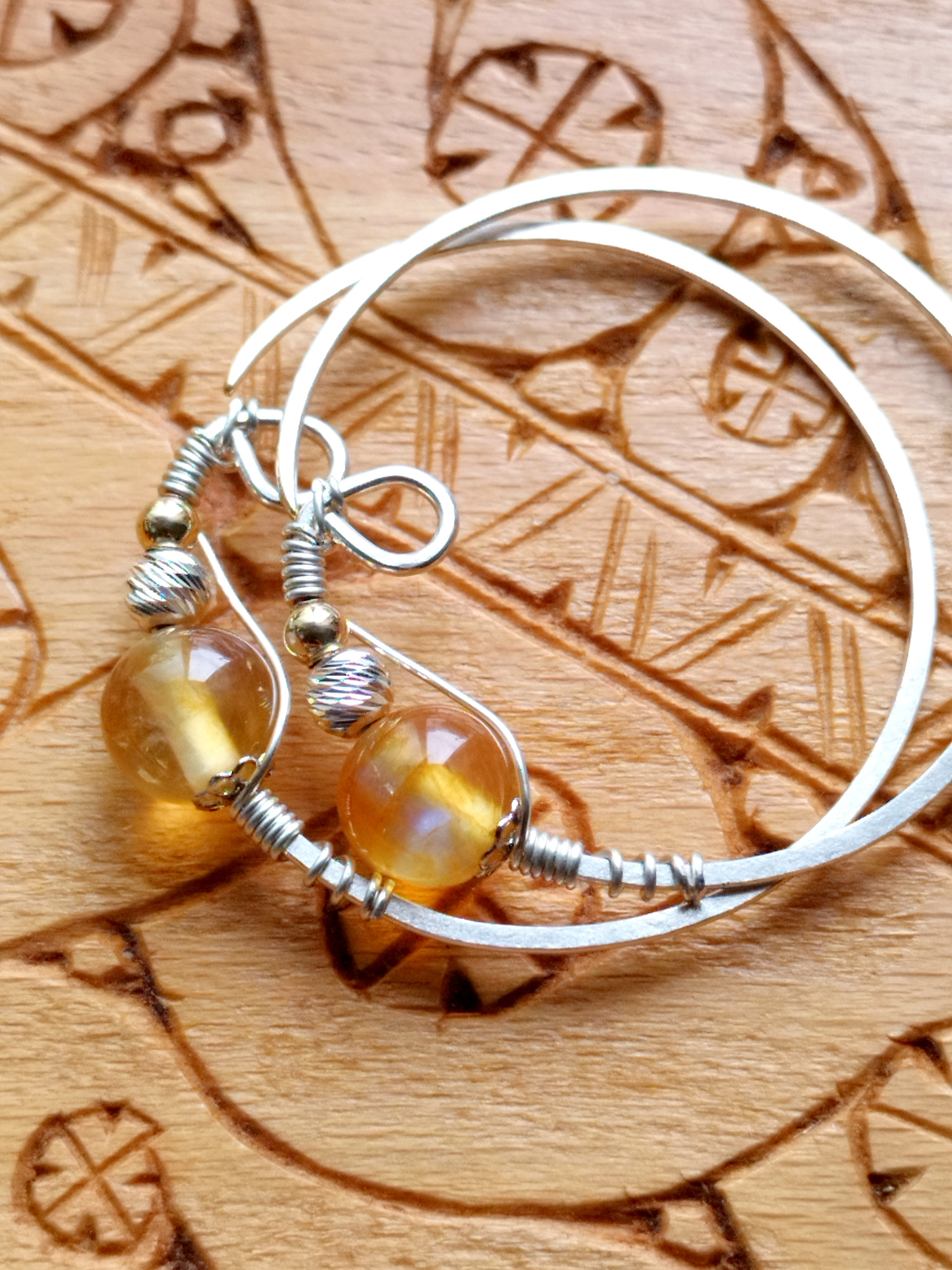 tokap cup（トカㇷ゚ チュㇷ゚・太陽）のニンカリ【アイヌの耳飾り・ピアス】プラジオクレース