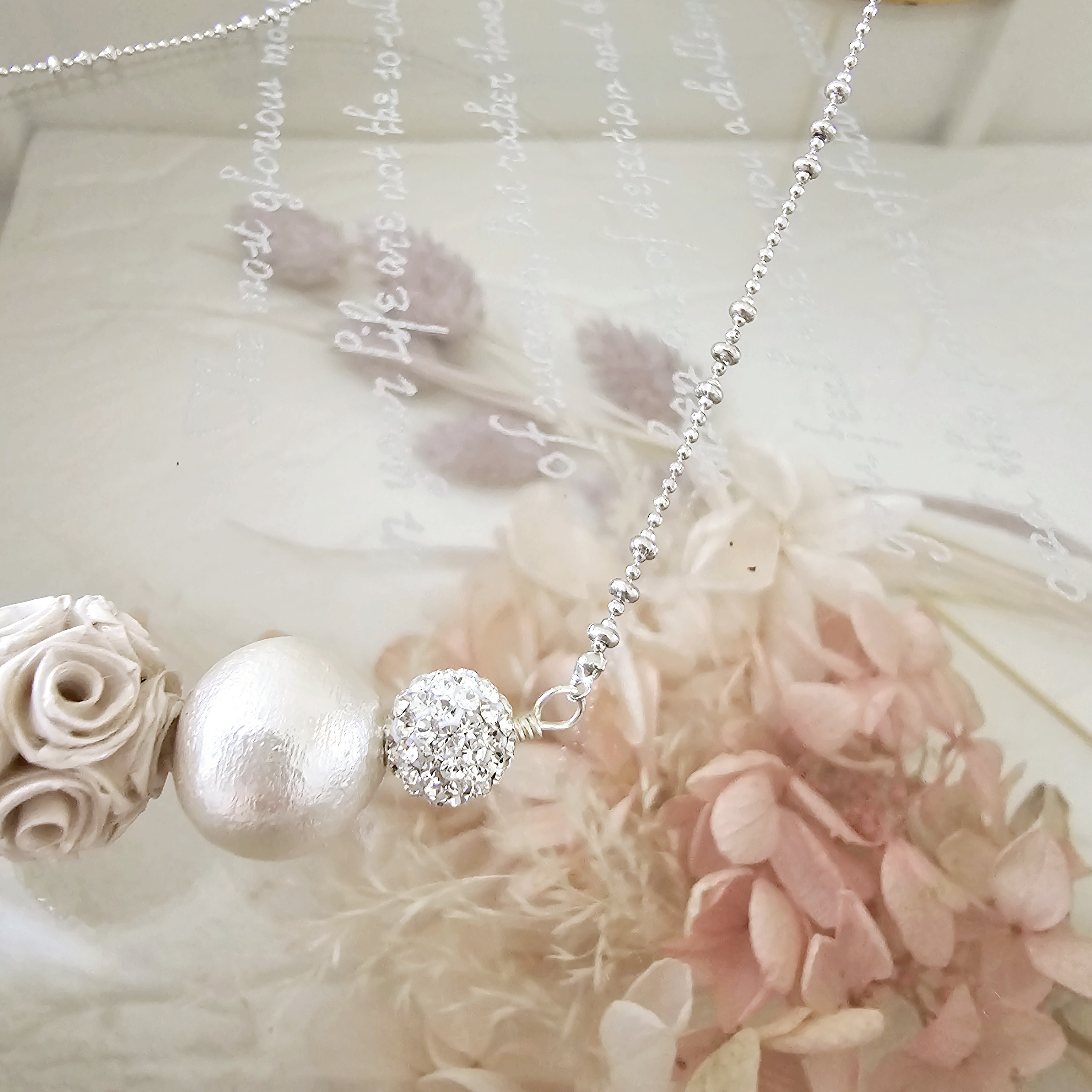 ミドル丈のお花のシルバーネックレス