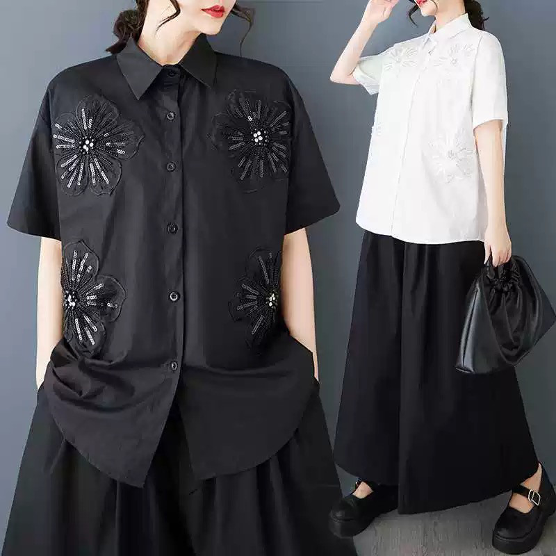 縫い合わせのゆったりしたシャツ