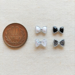 7.5×11mm　シルバーラメフレーム　小さなリボンのデコパーツ　モノトーン２色×２５個　合計50個セット　PN10 10枚目の画像