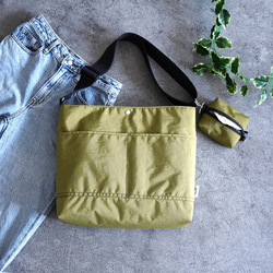 ⚮̈ミナペルホネン jungle relief シプリバッグ 巾着ショルダー