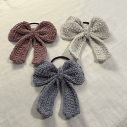 毛糸のヘアゴム【リボン/ピンク/キラキラ】編み物作家によるハンドメイド 2枚目の画像
