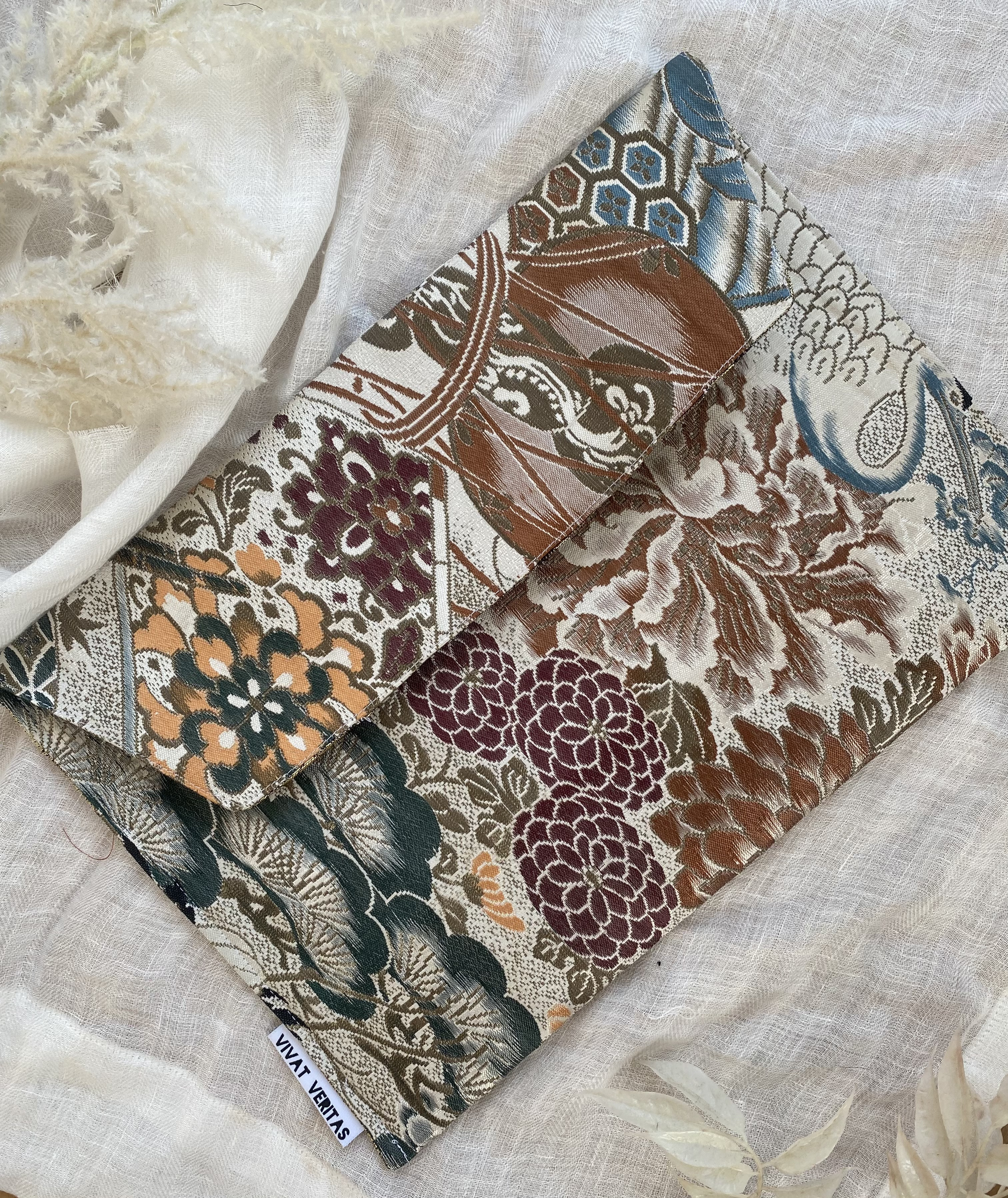 【帯リメイク】クラッチにもなるPCケース