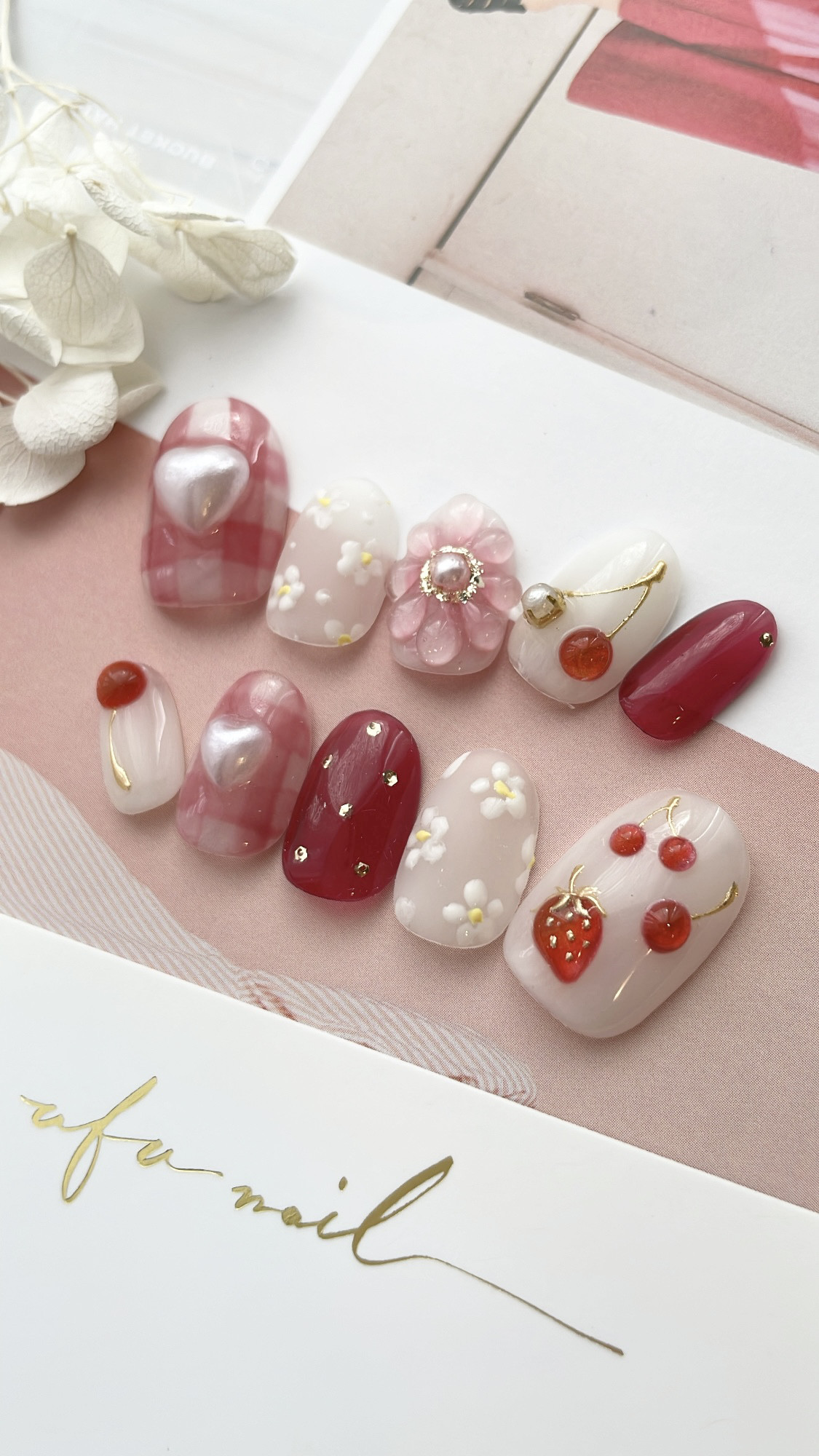 red strawberry checked nail