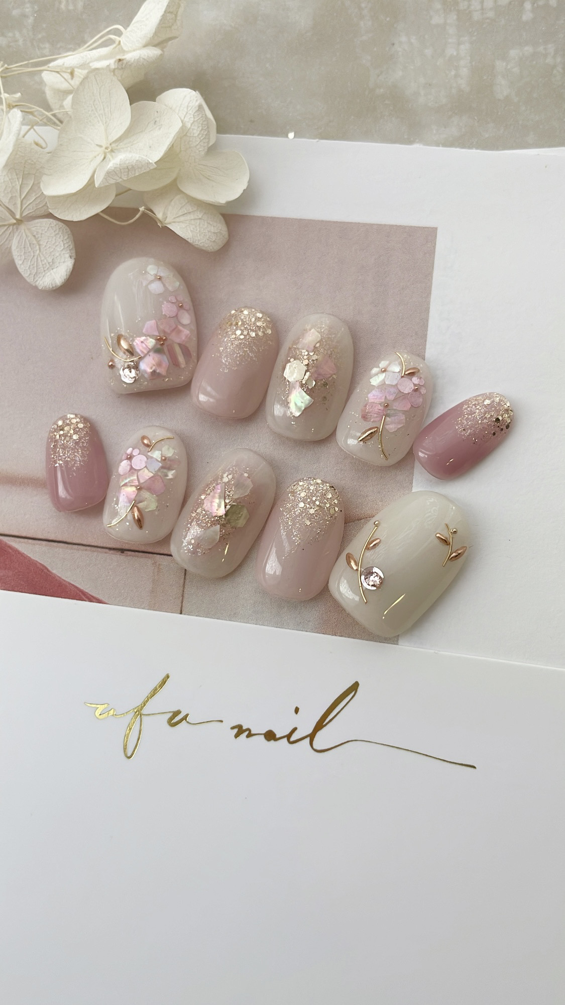 Sparkling pink shell flower nail