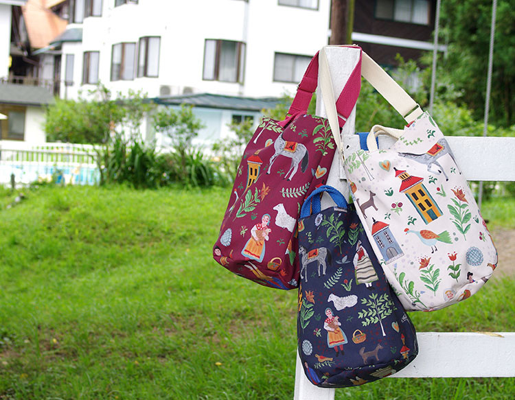 フォークっぽいほのぼのした馬柄のラウンドボトムバッグ