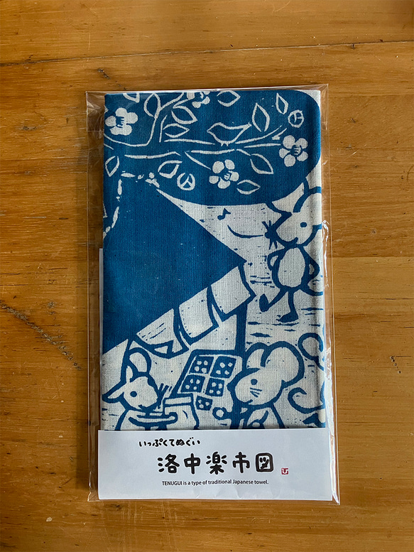 いっぷく手ぬぐい「洛中楽市図」　木版画作品を図柄に使用した染料手捺染の手ぬぐいです。額装や壁にかけても楽しめます 2枚目の画像