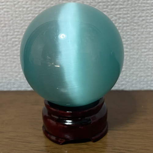 K◇キャッツアイ　丸玉　天然石　ハニー　猫目石1.500g　台座付き 送料無料＞入手困難！ハニーカラーキャッツアイ（猫目石）