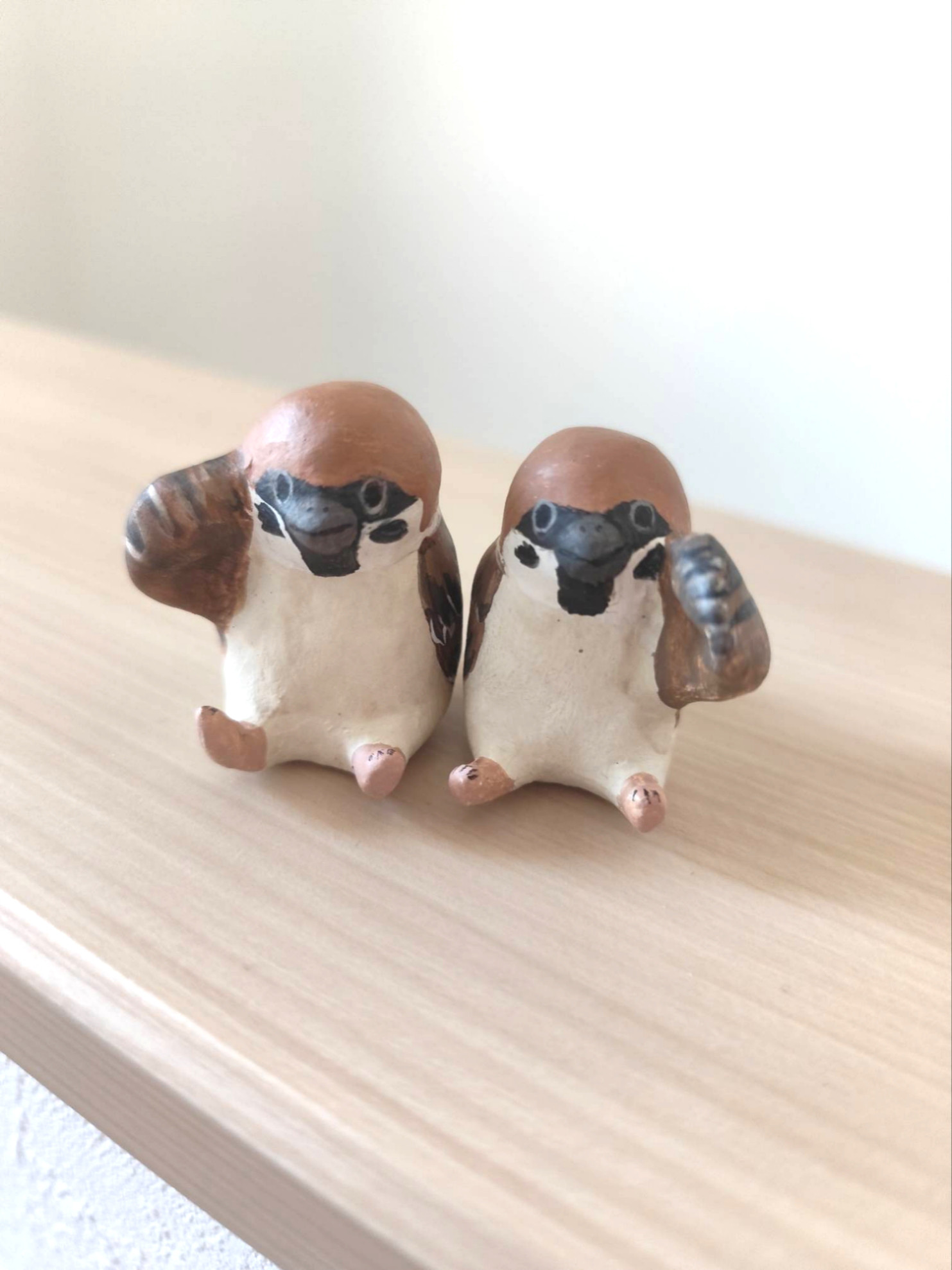 風をも掴む招き雀さん