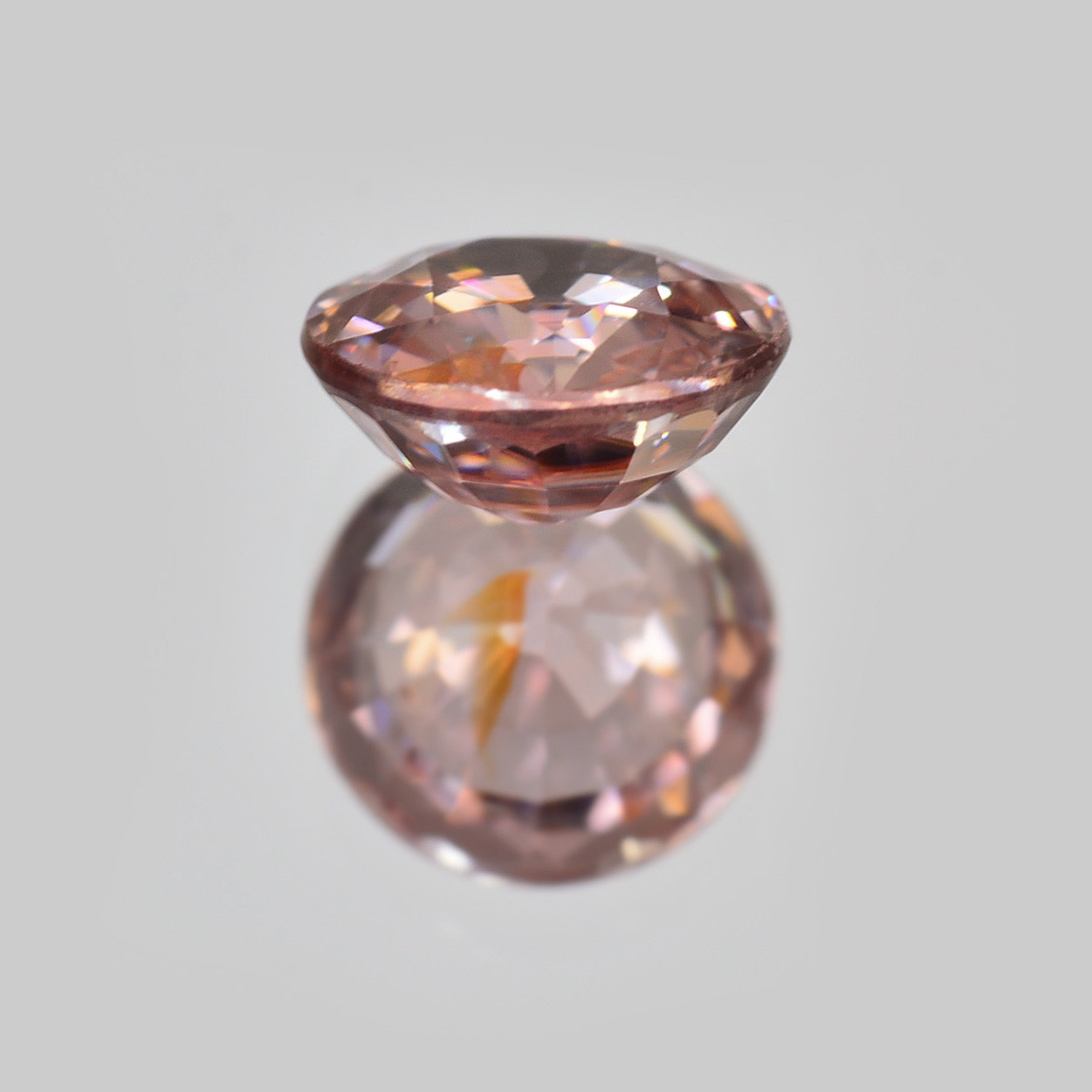 ソ付 オレンジピンク ジルコン 0.983ct ルース ラウンド